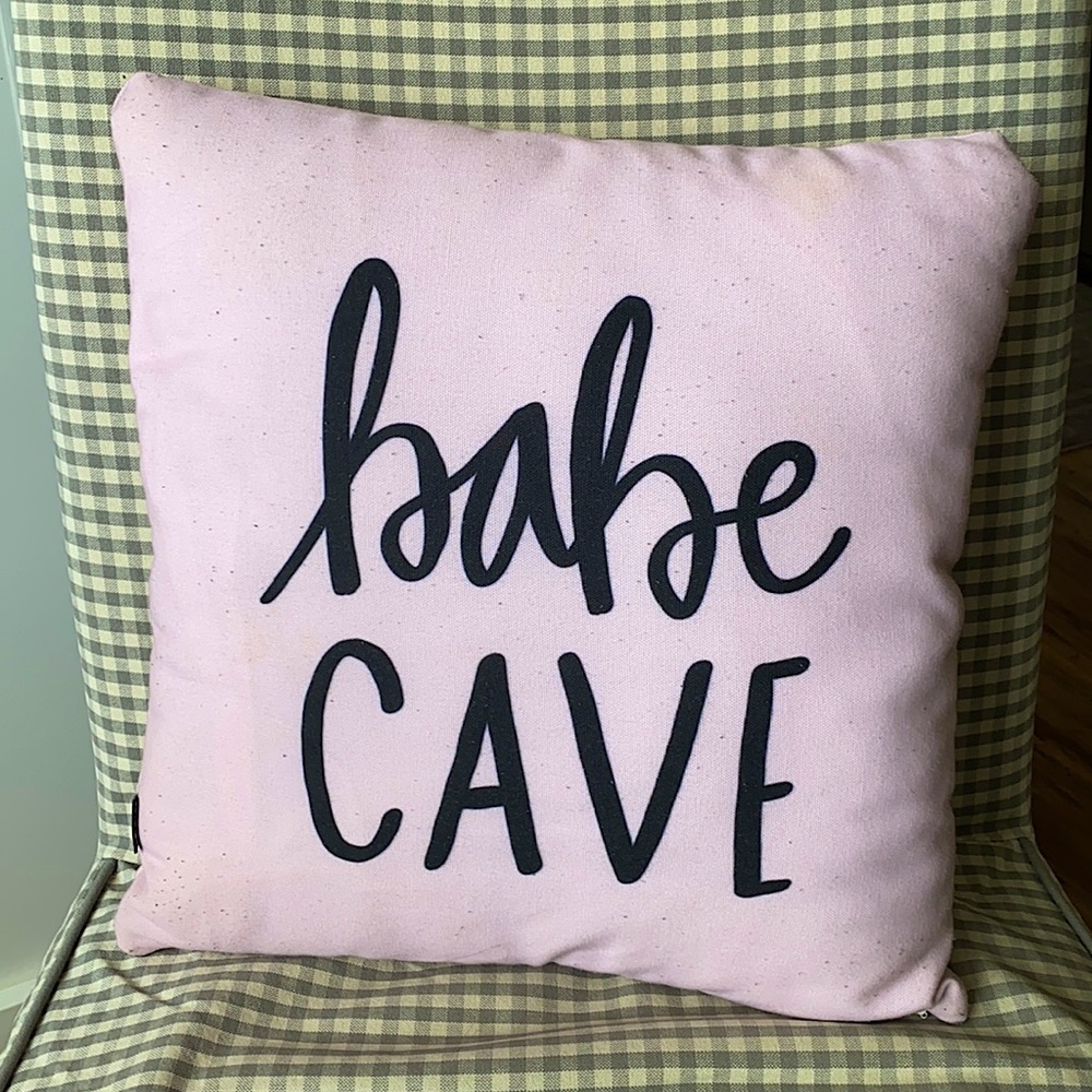 “babe cave” light pink throw pillow